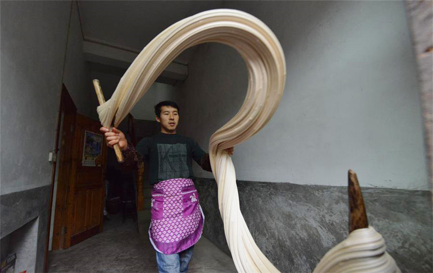 Guizhou: Bauer kreiiert spezielle Sü?igkeiten fürs chinesische Neujahr