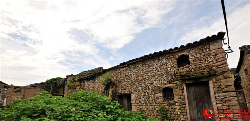 Tausendj?hriges Dorf vereint Konfuzianismus und Kommerz