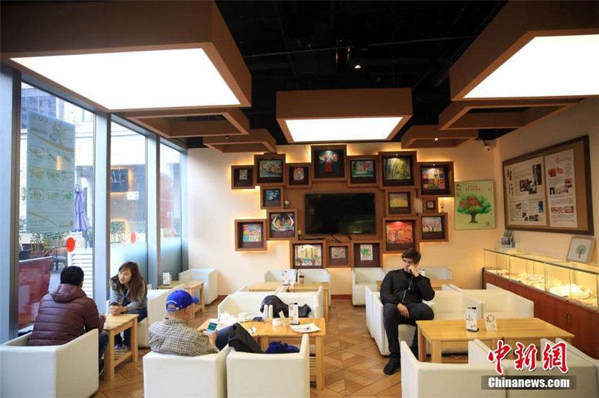 Das w?rmste Café Shanghais: Mitarbeiter aus AIDS-Familien