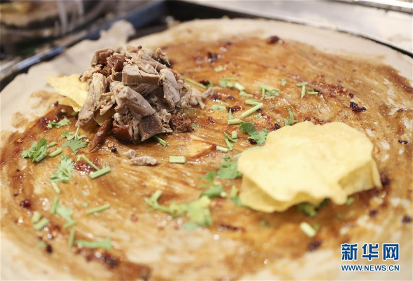 US-Amerikaner verkauft chinesische Pfannkuchen in New York