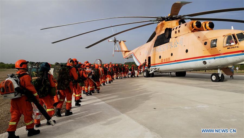 Fast 4.000 Menschen k?mpfen gegen Waldbr?nde in China