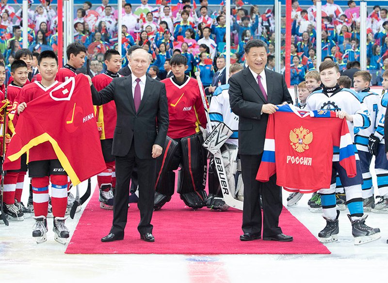 Putins China-Reise: Hochgeschwindigkeitszug, Eishockey, lokale Snacks
